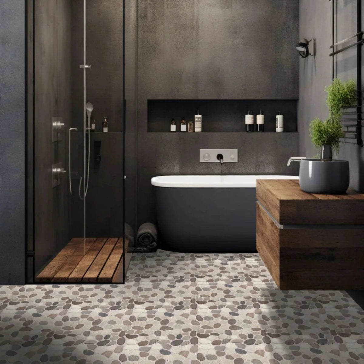 Capucino pebble tile flooring in dark bathroom surrounded by shower and toilet