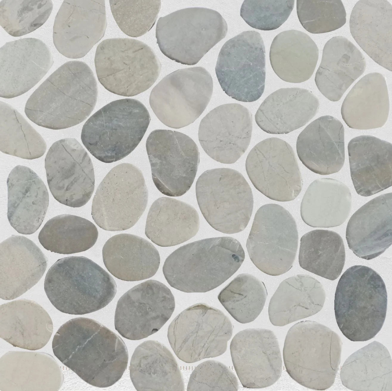 Pale sliced pebble flooring with grout close up sample