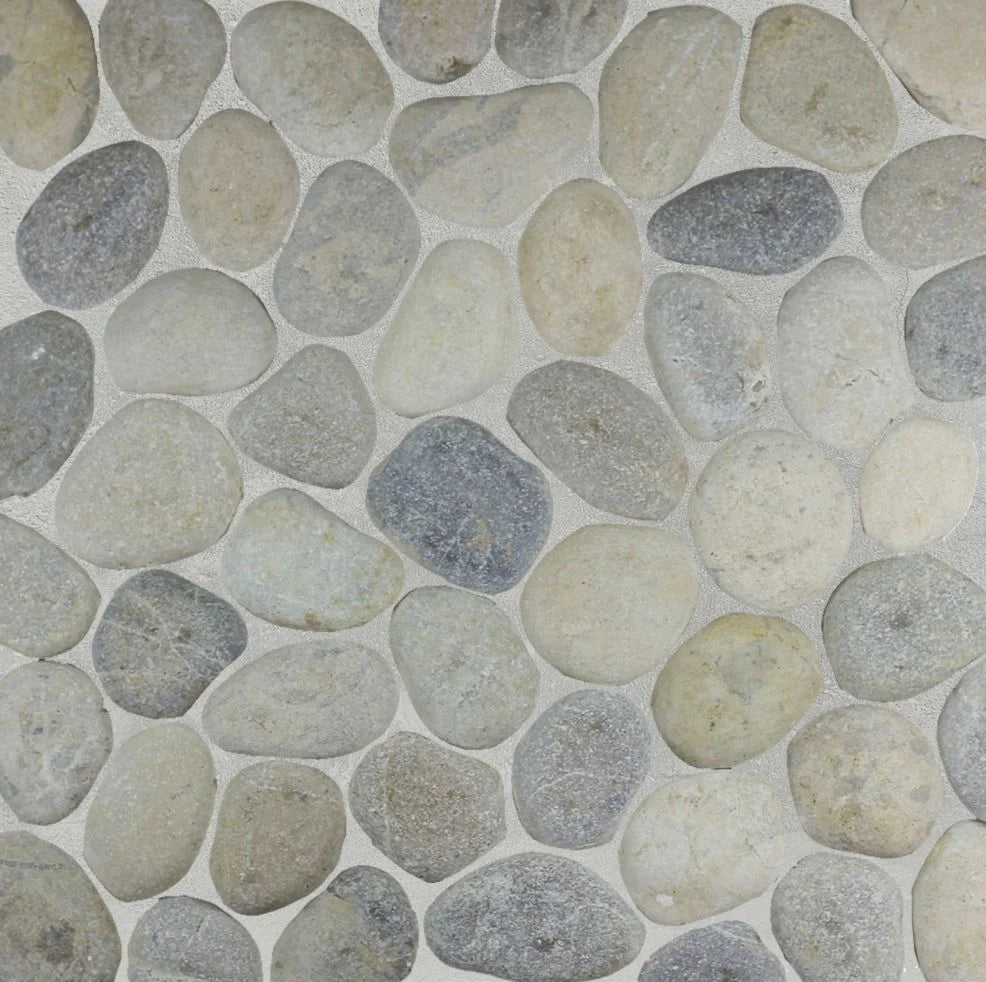 grey pebble tile sample close up with grout